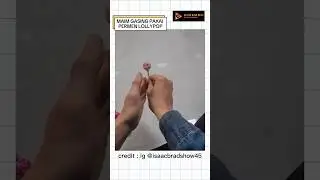 main gasing pakai permen lollypop