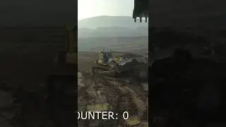 KOMATSU Bulldozer Scraping top layer of mud at the coal mine