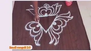 creative triangle rangoli design for beginners..... easy kolam design....