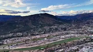 Evening landscape captured, Mountain background with twilight and urban development seen from above