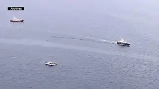 Italian coastguards mount dramatic migrant rescue off Lampedusa coast