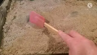Drying sand by baking it