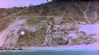 LVTs (landing vehicle, tracked) on beach of Kerama Retto in Pacific Theater. HD Stock Footage