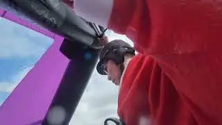 Santa Claus wing foiling in 2024 Christmas at Sandridge beach Port Melbourne