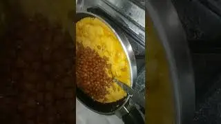 Cooking paneer and ragi paratha and kale chana