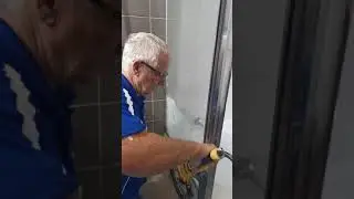 How to remove calcium build up from glass shower screens.
