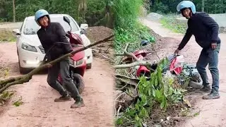 小伙路过乡村小道发现树枝横挡路中央，停下电动车收拾残局，将道路清理干净！#正能量剧情