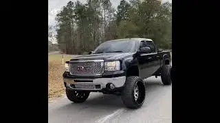 My gmc truck with 24x14s & 5s 7 inch lift