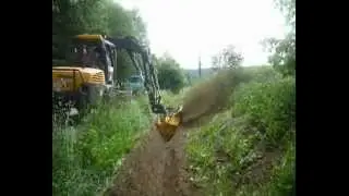 ODMULARKA POGŁĘBIARKA ROW&Oacute;W MELIORACYJNYCH