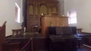 Monk playing Organ at New Norcia