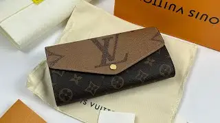 Lv dual color long button wallet M80726