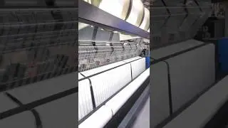 04 Wide weaving machine making white stretchy cloth | Shanghai Textile Expo 2025
