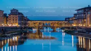 River Arno and famous bridge Ponte Vecchio day to night timelapse after sunset from Ponte alle