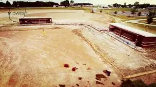 Laying sod on a baseball field in fort recovery ohio