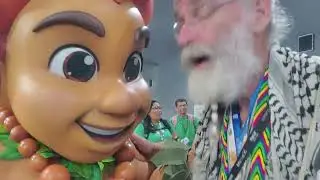 SustainaClaus with Curupira the Brazilian Forest Protector at COP30