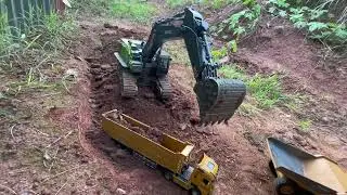 komatsu pc450lc excavator and yigong tractor truck for earth moving m&aacute;y x&uacute;c xe tải xe đầu k&eacute;o 