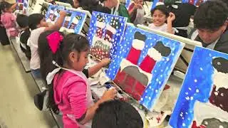 Eric White Elementary 1st and 6th grade painting the Santa 