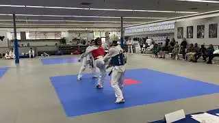 One on one taekwon do sparring for black belt Dan promotions.