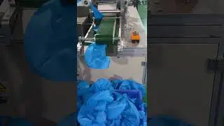 Watch This Machine Produce 80 Doctor Caps Per Minute &mdash; Fully Automatic Output!
