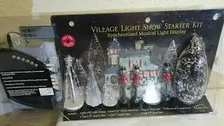 Santa's best village light show synchronized musical