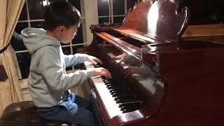 Talented 8-year Cary playing Invention 14 by Bach