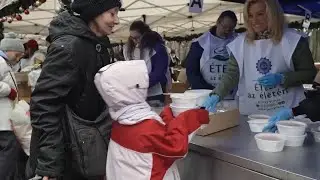Hare Krishna devotees in Hungary give food to people in need at Christmas