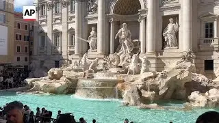 Pumps in hidden chamber control water flowing to Rome's iconic Trevi fountain; AP explains