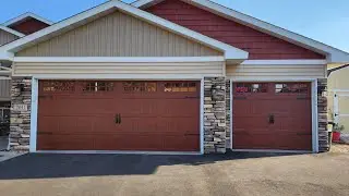 Installation of Haas garage doors by the Overhead door company.