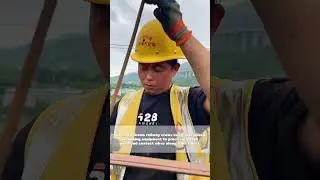 Wire Wizardry: Watch These Railroad Magicians String Up High-Voltage Cables!