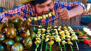 Cooking snails bbq and eating in the wild - Grilled snails bbq recipe from wild life