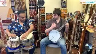 Sandyman and Dan jams together in Guru Soundz. Tabla & Banjo.