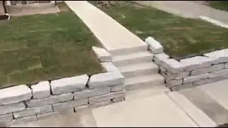 Delaware split slab natural stone retaining wall sod brick patio extension