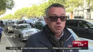 James Bond cars parade through Paris