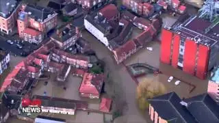 Unprecedented flooding submerges parts of England