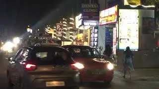Кандолим. Гоа. Индия. Центр города. Вечер.Candolim. Goa. India. City center. Evening.