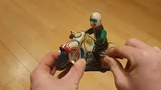 wind up tin plate motorcycle toy