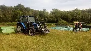 Brush harvesting wildflower seed at Waun Las NNR, National Botanic Garden of Wales