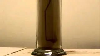 The reaction between iron and chlorine gas