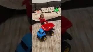 Kid loading and unloading truck toy