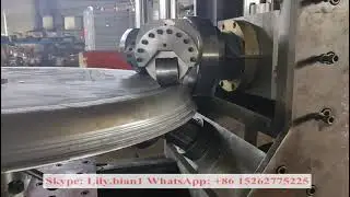 Tank head flanging machine