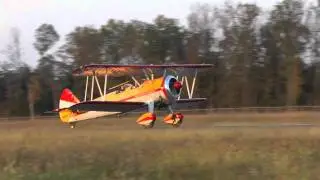 Stearman, N450JW Low Pass, slip then landing at KHWY on 101010 at 1819