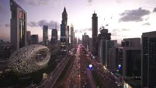 4K Aerial view of futuristic Dubai skyline at night