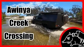 Chopped 200 Series Landcruiser crossing Awinya Creek on Fraser Island