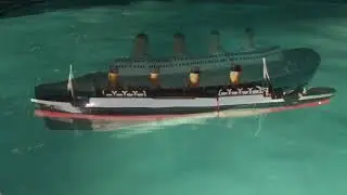 RMS Titanic Submersible Model illuminated pool at Night, Vintage Titanic toy, Sinking Titanic Model
