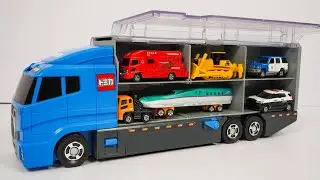 はたらくくるまのトミカのミニカーを開封してコンボイへ収納します。