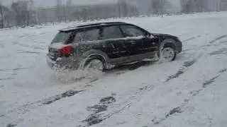 Subaru outback on snow