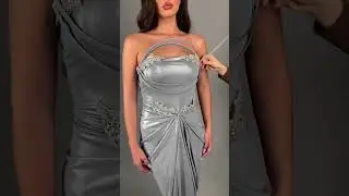 Share with a friend who would own the spotlight in this metallic silver gown! To order, send us a DM