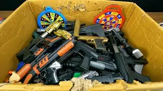 Box Filling With Toy Guns And Pistols, Realistic Toy Guns, Uzi, Kanas, Kalashnikov AK-47, Tec-9