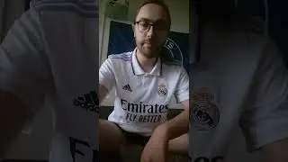 Smoke a red in R&eacute;al Madrid jersey
