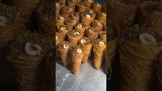 Indulge in this golden, cheesy, and syrupy kunafa cone!!! Order now!!